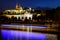 Prague castle in Hradcany with Vlatava river and lights from boats