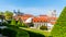 Prague Castle and St Nicholas Church in Lesser Town of Prague. Sunny spring day view from Vrtba Garden. Prague, Czech