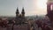 Prague central old square with Tyn Church at sunrise. Popular tourist attraction.