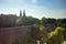 Prague cityscape in late afternoon sun with St. Peter and St. Paul basilica in the background