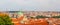 Prague cityscape panorama - city landscape with Towers of the Church of Saint Nicholas, Czech republic