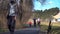 Prague, CZECH - May 1. 2020: Senior Pedestrians Couple walking with protective masks on their faces, Young Family in the