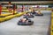 Prague, Czech Republic - 02.02.2020: Karting racers struggling on circuit in indoor go-kart track in Prague, Czech