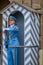 Prague, Czech Republic - 13 August, 2015: Palace guards on duty wearing their distinctive blue uniforms, white striped