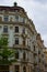 Prague, Czech Republic; 5/17/2019: Facade of a typical czech building in a street in middle of Prague