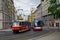 Prague, Czech Republic; 5/17/2019: Red old tram circulating beside an red new one
