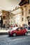 PRAGUE, CZECH REPUBLIC - Aug. 23, 2019: a small stylish modern car on a cobblestone road with rails against the background of the