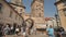 Prague, Czech Republic - August 5, 2018: Tourists cross the Charles Bridge on the Path of the Kings leading to the