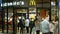 PRAGUE, CZECH REPUBLIC, DECEMBER 22, 2020: Coronavirus mask face mcdonalds fast food restaurant snacks bar shop shopping