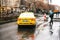 Prague, Czech Republic - December 24, 2016 - yellow taxi on the faces of the city