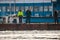 Prague, Czech republic - February 12, 2021. Men on boat broking ice and moving that out of creek