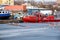 Prague, Czech republic - February 18, 2021. Red boat Mistral breaking ice in creek of Cisarska louka