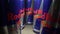 Prague, Czech Republic - February, 2020: dolly shot of camera gliding between aluminium Red Bull energy drink can on dark