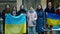 PRAGUE, CZECH REPUBLIC, FEBRUARY 24, 2022: Demonstration Ukrainian women girls sings national anthem hymn people against