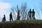 Prague, Czech Republic, January 2015. Stone figures of players against the sky on a hill in a zoo.