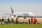 Prague, Czech Republic - March 14, 2014. People watching airplanes Landing and taking off at the airport