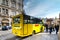 PRAGUE, CZECH REPUBLIC - MARCH 5, 2016: Yellow tourist bus stoped on Old Town in Prague, Czech Republic. on March 5, 2016