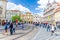 Prague, Czech Republic, May 13, 2019: people are walking crossing tram tracks on Malostranske namesti square