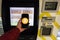 Prague, Czech Republic - May 18th 2019: Bitcoin ATM machine for buying and selling cryptocurrency. Male sells Bitcoins by ATM