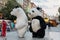 Prague, Czech Republic - May 26, 2018: Men dancing in a Polar bear and Panda bear fancy dress costumes entertains a crowd of