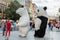 Prague, Czech Republic - May 26, 2018: Men dancing in a Polar bear and Panda bear fancy dress costumes entertains a crowd of