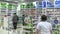 PRAGUE, CZECH REPUBLIC, NOVEMBER 27, 2017: Authentic operation of pharmacy interior, customers and pharmaceuticals