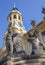 PRAGUE, CZECH REPUBLIC - OCTOBER 14, 2018: The baroque angel before facade of Loreto church  - designed by Kilian Ignac 1772