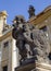 PRAGUE, CZECH REPUBLIC - OCTOBER 14, 2018: The baroque angel before facade of Loreto church  - designed by Kilian Ignac 1772