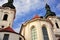 Prague, Czech Republic - October 2015: Exterior view of the Strahovsky Monastery with blue cloud sky