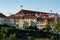 Prague, Czech republic - September 19, 2020. Panoramic view on building in Uvoz steet with Czech flag on the roof