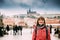 Prague, Czech Republic. Young Caucasian Woman Smiling In Street