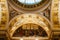 Prague, Czechia - A vertical shot of the interior of The National Museum and its main hall with the predominant use of gold to