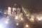 Prague in foggy evening