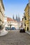 Prague, narrow street and spikes of the Cathedral