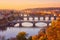 Prague, panoramic view to the historical bridges, old town and Vltava river from popular view point in Letna park, Czech Republic