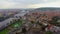 Prague\'s old town fly through, narrow streets, red rooftops cars