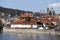 Prague St. Nicholas` Cathedral with the Lesser Town above River Vltava in the sunny Day, Czech Republic