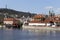 Prague St. Nicholas` Cathedral with the Lesser Town above River Vltava in the sunny Day, Czech Republic