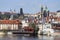 Prague St. Nicholas` Cathedral with the Lesser Town above River Vltava in the sunny Day, Czech Republic