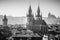 Prague towers of Old Town with Tyn church aerial view and Prague Castle, black and white, travel to Prague