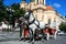 Prague - town square with horses for turistic ride and St. Nicho