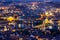 Prague at twilight blue hour, view of Charles Bridge on Vltava with Mala Strana and Old Town