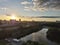 Prague viewpoint: river, city, trees, sunset