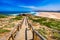 Praia da Bordeira and boardwalks forming part of the trail of tides or Pontal da Carrapateira walk in Portugal. Amazing view of