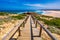 Praia da Bordeira and boardwalks forming part of the trail of tides or Pontal da Carrapateira walk in Portugal. Amazing view of