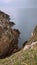 Praia do Arraial do Cabo Atalaia, located between rocky valleys and surrounded by mountains.