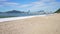 Praia do Buraco beach with the skyline of Balneario Camboriu on the background, Santa Catarina, Brazil