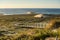 Praia do Guincho Beach and Hotel Fortaleza on a summer day in Sintra, Portugal