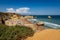 Praia Dona Ana, Portugal - September 7, 2019 - People enjoying a day at the beach at Praia Dona Ana, Portugal