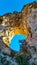 Praiano - Woman standing in the rock formation Montepertuso Il Buco in Positano and Praiano, Amalfi Coast, Campania, Italy, Europe